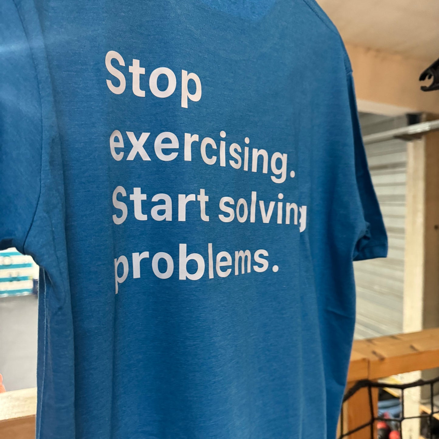GREX MERCH T-Shirt - Stop exercising. Start solving problems.