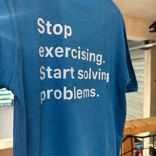 GREX MERCH T-Shirt - Stop exercising. Start solving problems.